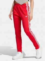 Adidas Spodnie dresowe adicolor SST IK6603 Czerwony Slim Fit. Czerwone spodnie dresowe Adidas, xl, bez wzorów, z dresówki. Za 189.99 zł.