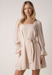 Beżowa Sukienka VICES z Siateczkowymi Rękawami i Wiązanym Paskiem Resnala. Brązowe sukienki Born2be, na co dzień, l, bez wzorów, z materiału, eleganckie, bez kołnierzyka, bez ramiączek, midi, rozkloszowane. Za 159.99 zł.