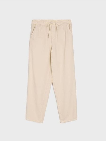 Jeansy jogger balloon z lyocellem - beżowy. Brązowe jeansy Sinsay, bez wzorów. W wyprzedaży za 39.99 zł.