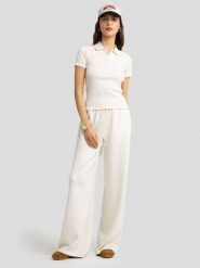 BIG STAR Koszulka polo w kolorze kremowym rozmiar: M. Brązowe bluzki Big Star, m, bez wzorów, z bawełny, bez kołnierzyka, bez ramiączek. Za 49.99 zł.