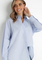 Jasnoniebieska Koszula Doriemara. Niebieskie koszule Born2be, l, bez wzorów, bez kołnierzyka, bez ramiączek. Za 84.99 zł.