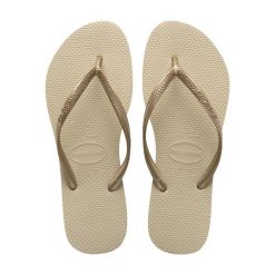 Klapki Havaianas Model 4000030 Kolor Złoty. Żółte klapki Havaianas, bez wzorów, z gumy, bez obcasa. Za 158.00 zł.