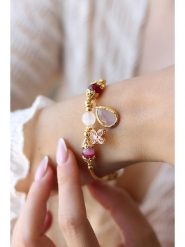 Pierres delicates Pozłacana bransoletka z kwarcem i agatem rozmiar: onesize. Żółte bransoletki Pierres delicates, z agatem, pozłacane. Za 88.02 zł.