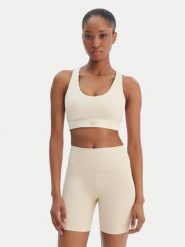 Reebok Biustonosz sportowy Reebok x Ewa Chodakowska Ela RK25615CCW Beżowy. Brązowe koszulki sportowe Reebok, bez wzorów, z syntetyku, bez ramiączek, na fitness i siłownię. Za 179.99 zł.