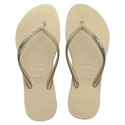 Klapki Havaianas Model 4146093 Kolor Beżowy. Szare klapki Havaianas, bez wzorów, z gumy, bez obcasa. Za 200.50 zł.