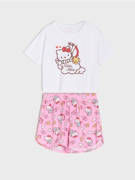 Bawełniana piżama dwuczęściowa z nadrukiem Hello Kitty - biały. Białe piżamy Sinsay, bez wzorów, z bawełny, bez ramiączek. Za 49.99 zł.