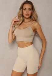 Beżowe Elastyczne Szorty Biker o Fasonie Bodycon Marelliam. Brązowe szorty Renee, z aplikacjami, z materiału, sportowe. Za 24.99 zł.