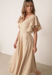 Beżowa Koktajlowa Sukienka o Rozkloszowanym Kroju z Falbanami Zamiast Rękawów Ghala. Brązowe sukienki Born2be, na co dzień, l, bez wzorów, eleganckie, bez kołnierzyka, bez ramiączek, maxi, proste. Za 299.99 zł.