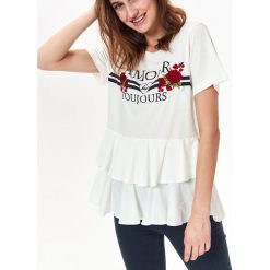 T-SHIRT DAMSKI Z HAFTEM, Z PODWÓJNĄ FALBANĄ. Białe t-shirty TROLL, m, bez wzorów, z bawełny, bez kołnierzyka, bez ramiączek. W wyprzedaży za 29.99 zł.