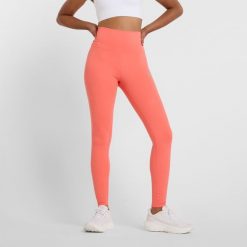 Legginsy damskie do jogi New Balance Harmony WP51126DTR – pomarańczowe. Brązowe legginsy New Balance, s, bez wzorów, z lycry, z podwyższonym stanem, na fitness i siłownię. Za 169.99 zł.
