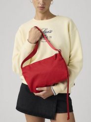 Levi's Torebka w kolorze czerwonym - 27,5 x 16,5 x 10 cm rozmiar: onesize. Czerwone torby na ramię Levi's®, bez wzorów, z materiału, na ramię, bez dodatków. Za 84.21 zł.
