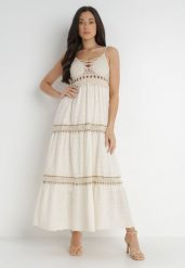 Jasnobeżowa Sukienka Chrysis. Brązowe sukienki Born2be, m, z aplikacjami, z bawełny, boho, bez kołnierzyka, bez ramiączek, maxi, rozkloszowane. Za 199.99 zł.