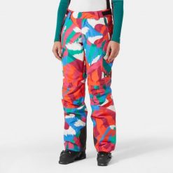 Damskie spodnie narciarskie z kieszeniami cargo Helly Hansen Switch. Czerwone spodnie narciarskie Helly Hansen, bez wzorów, narciarskie. W wyprzedaży za 700.75 zł.