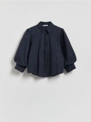 Koszula z bufiastymi rękawami - granatowy. Niebieskie koszule Reserved, l, bez wzorów, z bawełny, bez kołnierzyka, bez ramiączek. Za 139.99 zł.