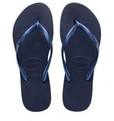 Klapki Havaianas Model 4000030 Kolor Niebieski. Niebieskie klapki Havaianas, bez wzorów, z gumy, bez obcasa. Za 94.99 zł.