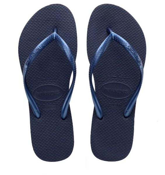 Klapki Havaianas Model 4000030 Kolor Niebieski. Niebieskie klapki Havaianas, bez wzorów, z gumy, bez obcasa. Za 94.99 zł.