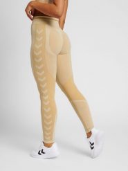 Legginsy damskie Hummel MT Lulu. Brązowe legginsy Hummel, l, bez wzorów, z dzianiny, z standardowym stanem. Za 177.05 zł.