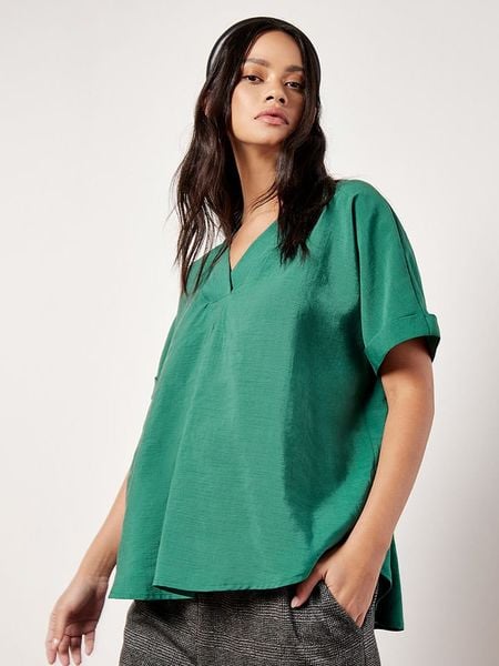 Apricot Bluzka w kolorze zielonym rozmiar: M. Zielone bluzki Apricot, m, bez wzorów, bez kołnierzyka, bez ramiączek. Za 78.66 zł.