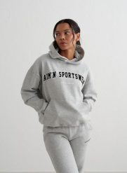 Damska bluza z kapturem, drapany polar, luźny Varsity Sweat Hood szary melanż. Szare bluzy AIM'N, l, bez wzorów, z bawełny, z kapturem. Za 344.00 zł.