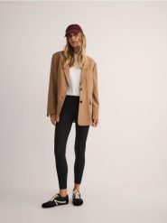 Gładkie legginsy - czarny. Czarne legginsy Reserved, l, bez wzorów, z dzianiny. W wyprzedaży za 49.99 zł.