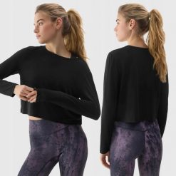 LONGSLEEVE DAMSKI 4F CROP-TOP DO JOG BLUZA Z DODATKIEM MODALU KOLOR CZARNY. Czarne bluzy 4f, l, bez wzorów, z materiału, bez kaptura. Za 79.99 zł.
