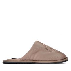 Kapcie Calvin Klein Jeans. Brązowe obuwie domowe Calvin Klein Jeans, bez wzorów, z jeansu, bez zapięcia. Za 209.99 zł.