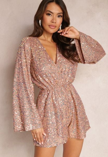 Różowy Kombinezon o Kopertowym Fasonie z Gumką w Pasie Ozdobiony Cekinami Nrevia. Czerwone sukienki Renee, m, bez wzorów, bez kołnierzyka, bez ramiączek, kopertowe. Za 99.99 zł.