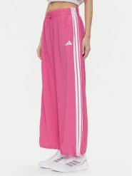Adidas Spodnie dresowe Essentials 3-Stripes JC8167 Różowy Loose Fit. Czerwone spodnie dresowe Adidas, m, bez wzorów, z dresówki. Za 179.99 zł.