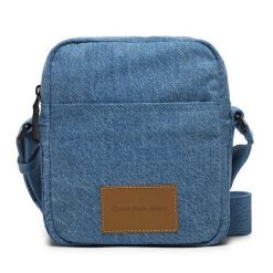 Torebka Calvin Klein Jeans. Niebieskie listonoszki Calvin Klein Jeans, bez wzorów, z jeansu, bez dodatków. Za 149.99 zł.