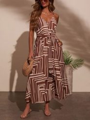 Milan Kiss Sukienka w kolorze brązowo-kremowym rozmiar: XL. Brązowe sukienki Milan Kiss, na imprezę, xl, bez wzorów, z tkaniny, bez kołnierzyka, bez ramiączek, maxi, rozkloszowane. Za 221.67 zł.