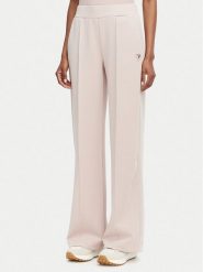 Guess Spodnie dresowe V6YB18 K4315 Różowy jasny Regular Fit. Czerwone spodnie dresowe Guess, xl, z aplikacjami, z dresówki. Za 394.99 zł.