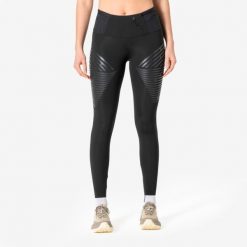 Legginsy do biegania damskie KIPRUN RHEON. Czarne legginsy KIPRUN, na zimę, l, bez wzorów, z elastanu, z podwyższonym stanem, do biegania. Za 299.99 zł.