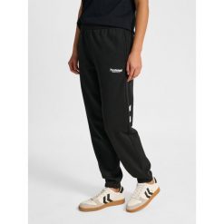 Damskie spodnie dresowe Hummel Legacy 2.0. Czarne spodnie dresowe Hummel, na co dzień, bez wzorów, z dresówki. Za 269.50 zł.