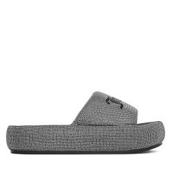 Klapki Juicy Couture. Czarne klapki Juicy Couture, bez wzorów, bez obcasa. Za 249.99 zł.