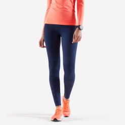 Legginsy do biegania damskie Kiprun Care. Niebieskie legginsy KIPRUN, na zimę, l, bez wzorów, z materiału, z podwyższonym stanem, do biegania. Za 89.99 zł.