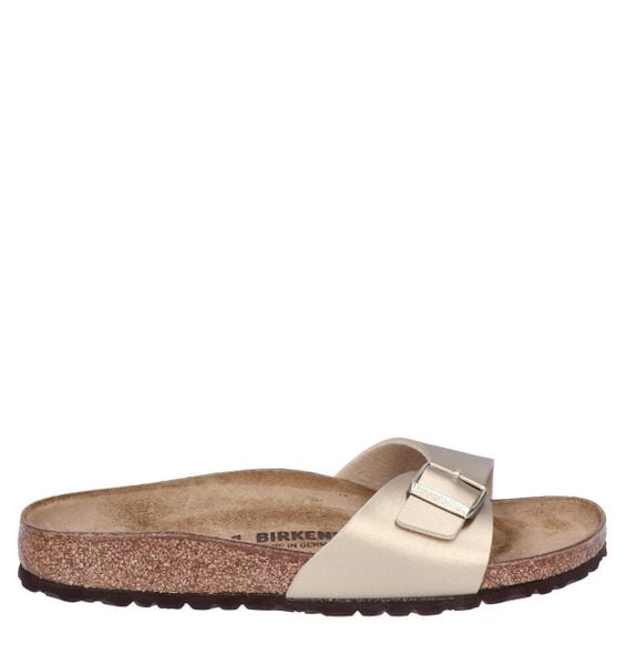 Klapki damskie Birkenstock Madrid. Żółte klapki Birkenstock, bez wzorów, z materiału, bez obcasa. Za 399.99 zł.