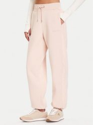 Guess Spodnie dresowe V5BB10 KB681 Różowy Regular Fit. Czerwone spodnie dresowe Guess, xl, z aplikacjami, z bawełny. Za 369.99 zł.