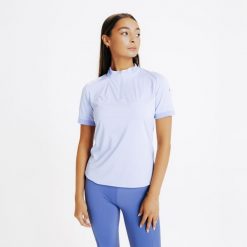 Koszulka jeździecka polo damska z krótkim rękawem Fouganza Heritage. Fioletowe koszulki polo FOUGANZA, na lato, xl, bez wzorów, z materiału, bez kołnierzyka, bez ramiączek. Za 49.99 zł.