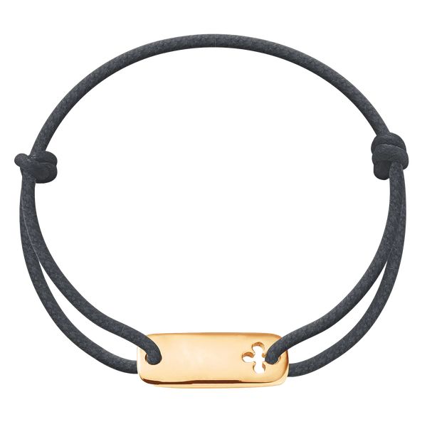 Bransoletka z pozłacaną blaszką z koniczyną na grubym grafitowym sznurku. Szare bransoletki Lilou, pozłacane. Za 159.00 zł.