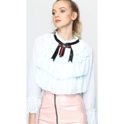 Jasnoniebieska Bluzka Helpless. Bluzki Born2be, s, z aplikacjami, bez kołnierzyka, bez ramiączek. Za 69.99 zł.