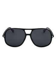Polaroid Okulary przeciwsłoneczne unisex w kolorze czarnym rozmiar: 57. Czarne okulary przeciwsłoneczne Polaroid, bez wzorów, z tworzywa sztucznego. Za 179.95 zł.