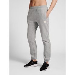 Damskie spodnie dresowe Hummel GG 12. Szare spodnie dresowe Hummel, s, bez wzorów, z dresówki. W wyprzedaży za 149.50 zł.