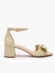 Jasnozielone sandały z kokardą. Zielone sandały Ryłko, bez wzorów, ze skóry, eleganckie, bez obcasa, na obcasie, bez zapięcia. Za 429.99 zł.