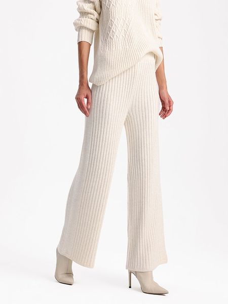 BGN Spodnie w kolorze kremowym rozmiar: 38. Brązowe spodnie materiałowe BGN, bez wzorów, z materiału. Za 96.60 zł.