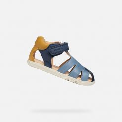 Sandały GEOX B SANDAL STEPPIEUP Niebieski. Niebieskie sandały Geox, bez wzorów, ze skóry, bez obcasa, bez zapięcia. Za 208.99 zł.