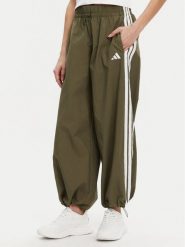 Adidas Spodnie dresowe Essentials 3-Stripes JE1308 Zielony Loose Fit. Zielone spodnie dresowe Adidas, l, bez wzorów, z dresówki. Za 179.99 zł.
