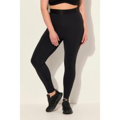 Damskie Legginsy sportowe LightFit kieszenie z recyklingu. Czarne legginsy Ulla Popken, plus size, bez wzorów, z elastanu. Za 244.99 zł.