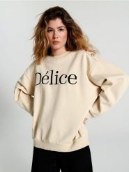 Bluza z haftem - kremowy. Białe bluzy Sinsay, l, bez wzorów, z bawełny, bez kaptura. Za 59.99 zł.