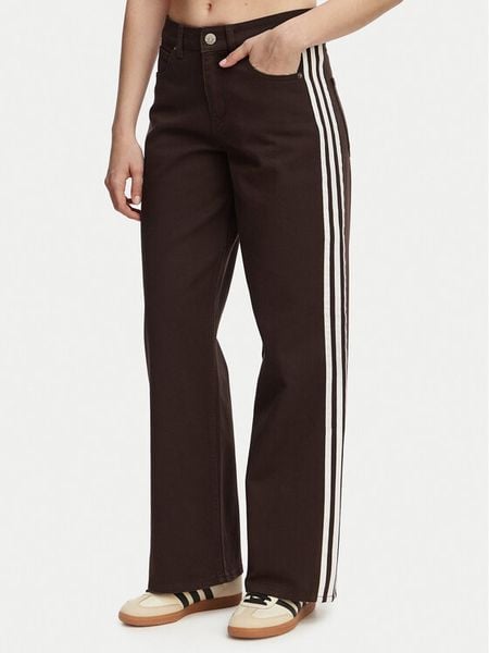Adidas Jeansy Firebird KD2934 Brązowy Loose Fit. Brązowe jeansy Adidas, bez wzorów. Za 293.99 zł.