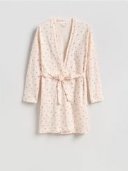 Wzorzysty szlafrok z paskiem - kremowy. Białe szlafroki Reserved, l, bez wzorów, z bawełny, bez ramiączek, bez kaptura. Za 119.99 zł.